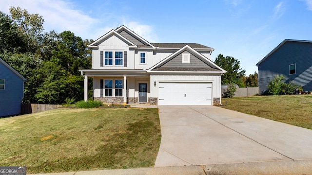 craftsman inspired home with a front lawn and a porch