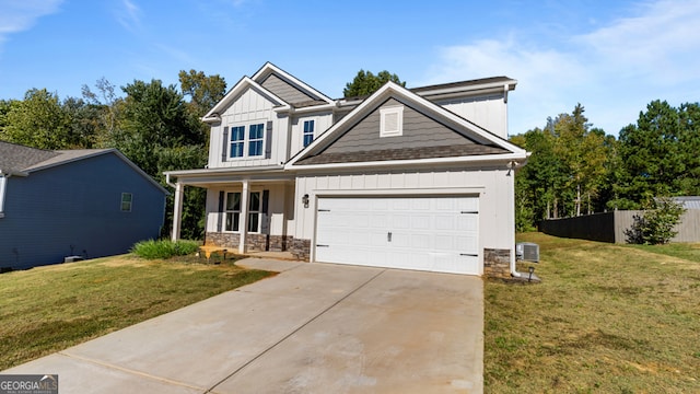 craftsman-style house with a porch, central air condition unit, and a front yard