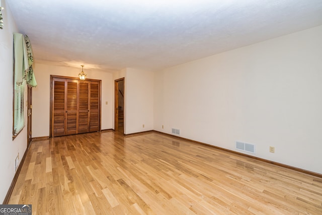 empty room featuring light wood-type flooring