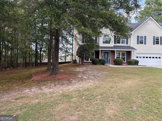 view of front facade featuring a front lawn and a garage