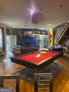 recreation room featuring pool table and hardwood / wood-style flooring