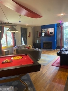 rec room with pool table and hardwood / wood-style floors