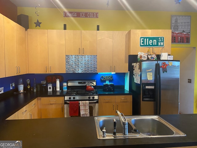 kitchen featuring light brown cabinets, appliances with stainless steel finishes, and sink