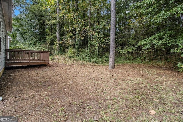 view of yard featuring a deck