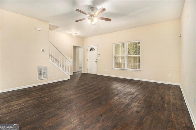 interior space featuring dark hardwood / wood-style flooring and ceiling fan