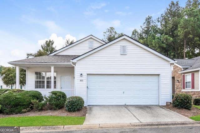 ranch-style home featuring a garage