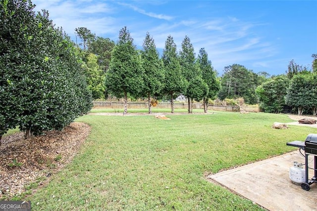 view of yard featuring fence