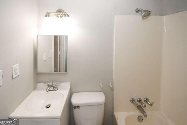 full bathroom with vanity, bathtub / shower combination, and toilet