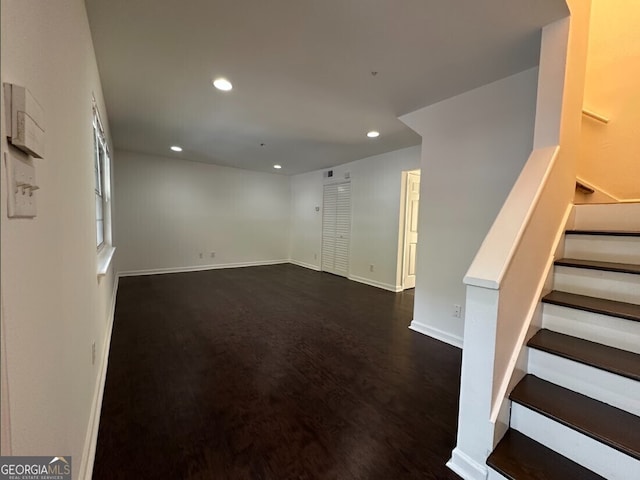 interior space with dark wood-type flooring