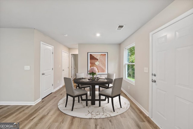 dining space featuring light hardwood / wood-style floors