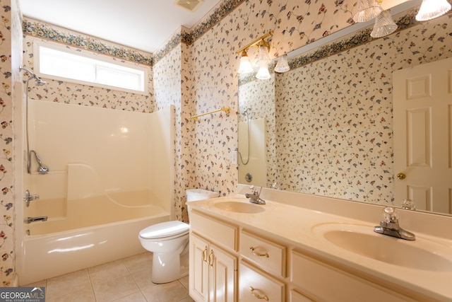 full bathroom with vanity, shower / bath combination, tile patterned flooring, and toilet