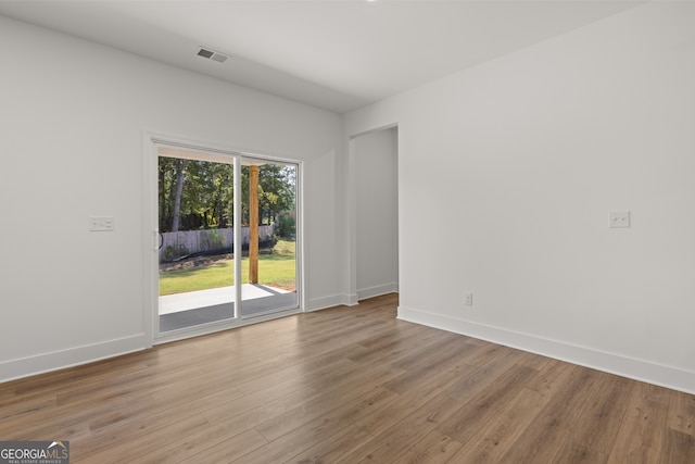 empty room featuring light hardwood / wood-style floors