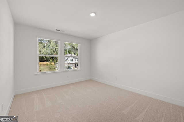 view of carpeted spare room