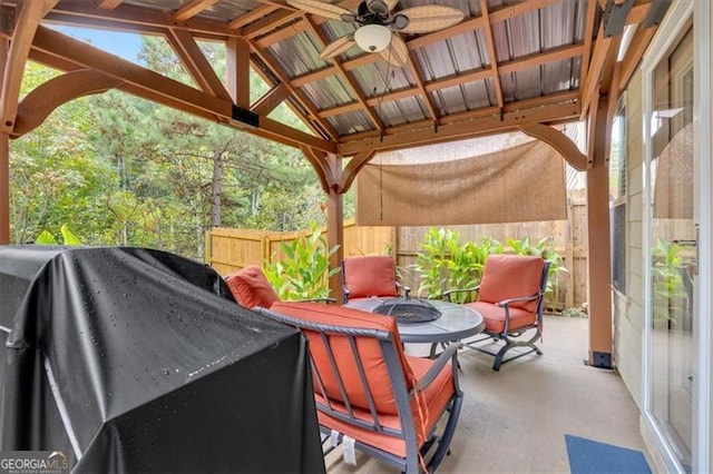 view of patio featuring a gazebo, grilling area, and ceiling fan