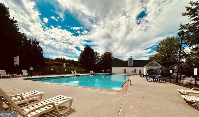 view of pool featuring a patio