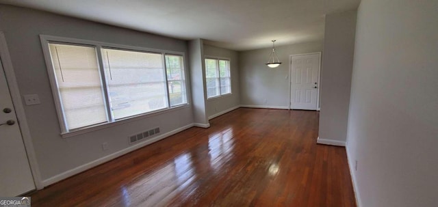 interior space with dark hardwood / wood-style floors