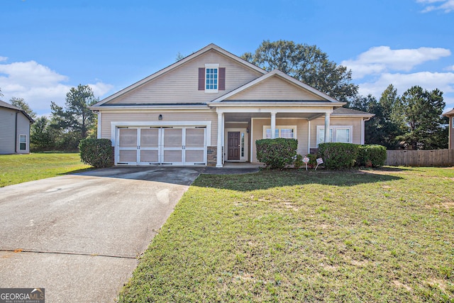 view of front facade featuring a front lawn and covered porch