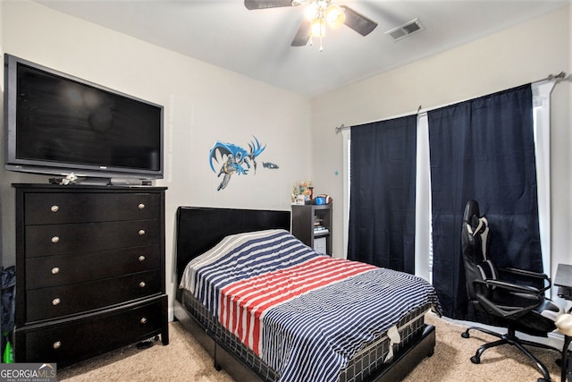 carpeted bedroom featuring ceiling fan