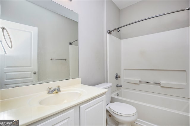 full bathroom featuring shower / bathtub combination, vanity, and toilet