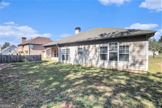 421 Bedford Xing, Mcdonough, GA 30253 - back of property with a chimney