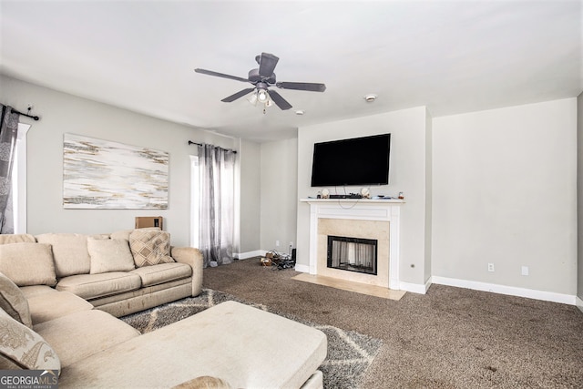 living room featuring carpet floors and ceiling fan