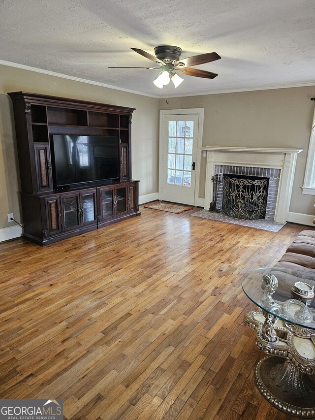 living room with hardwood / wood-style floors and ceiling fan