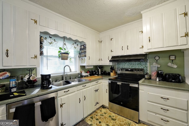 kitchen with ornamental molding, white cabinets, appliances with stainless steel finishes, and sink