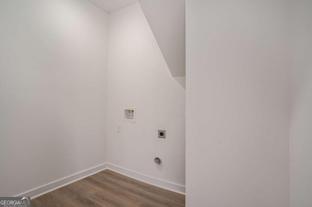 clothes washing area with hookup for a washing machine, dark wood-type flooring, and electric dryer hookup