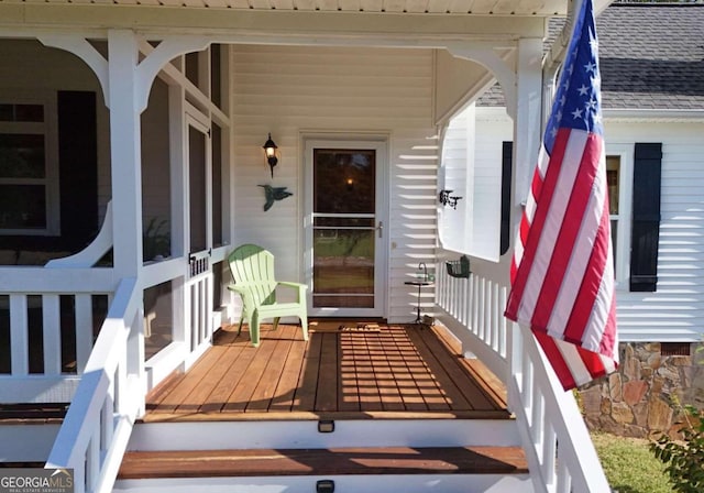 entrance to property with a porch