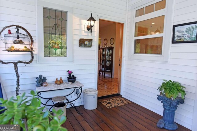 deck featuring an outdoor living space, a porch, and ceiling fan