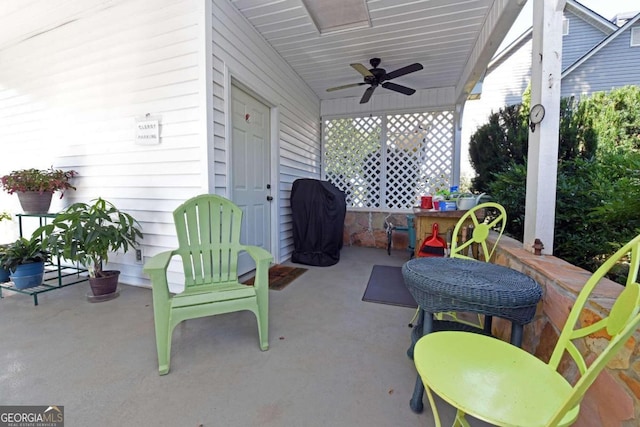 view of patio / terrace with ceiling fan and area for grilling