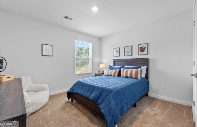 bedroom featuring carpet, visible vents, and baseboards