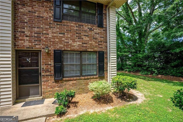 1235 Riverside Dr Unit C8, Gainesville, GA 30501 - doorway to property with brick siding and a yard
