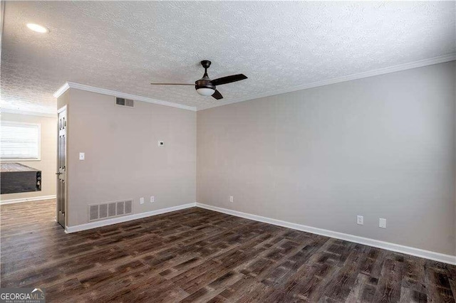 spare room featuring ornamental molding, dark hardwood / wood-style floors, a textured ceiling, and ceiling fan