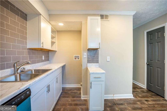 kitchen with white cabinetry, dishwashing machine, ornamental molding, dark wood-type flooring, and sink