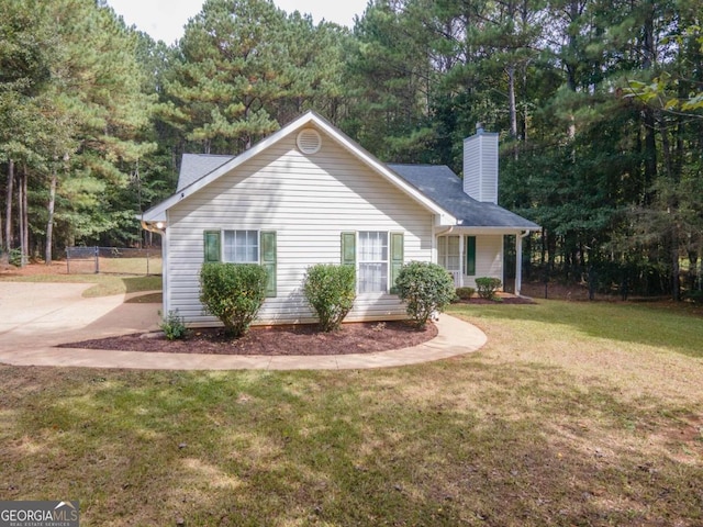 view of front of home with a front yard