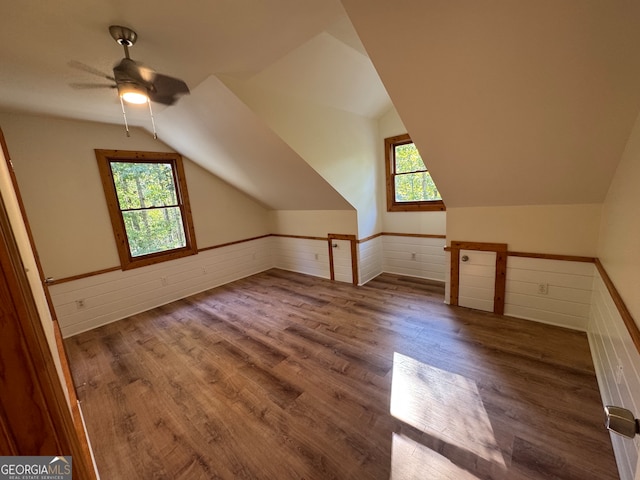 bonus room with lofted ceiling, ceiling fan, and hardwood / wood-style flooring