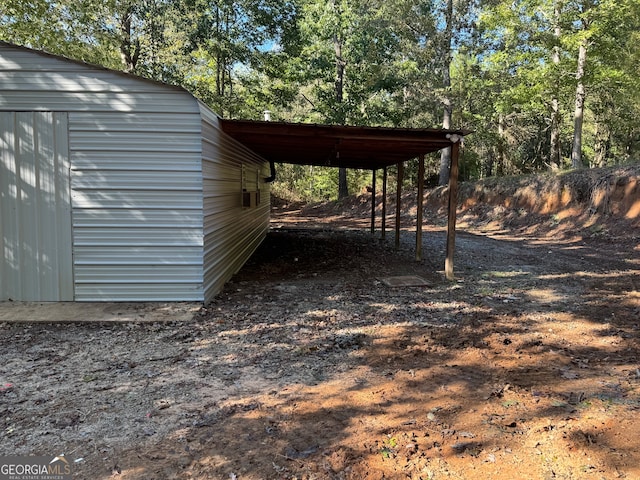 exterior space with a carport