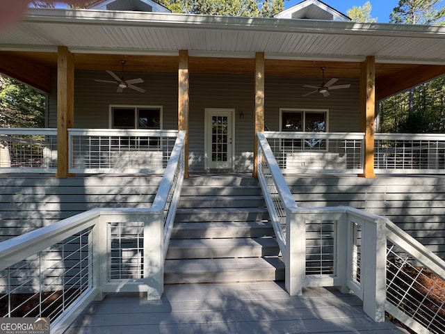 property entrance featuring ceiling fan