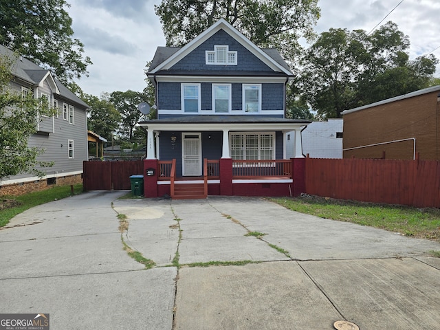 view of front of property featuring covered porch