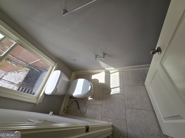 bathroom with tile patterned flooring