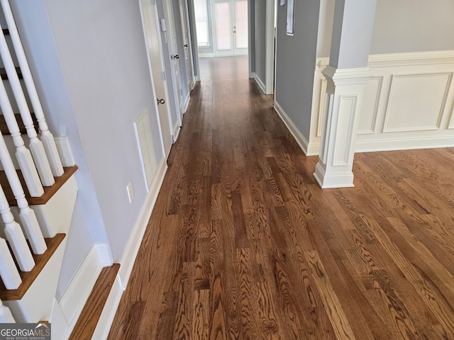 corridor with dark wood-type flooring