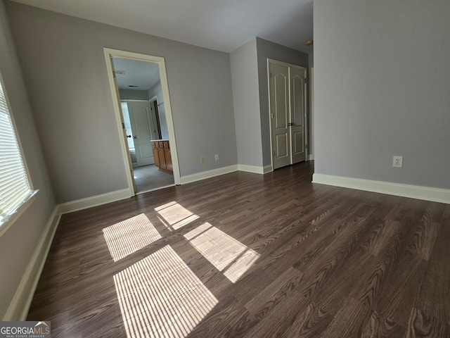 interior space with dark wood-type flooring