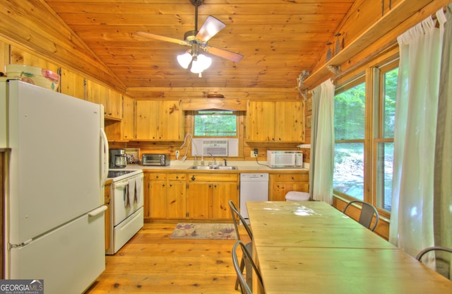 kitchen featuring white appliances, vaulted ceiling, wooden ceiling, light hardwood / wood-style floors, and plenty of natural light