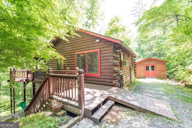 deck featuring a storage shed