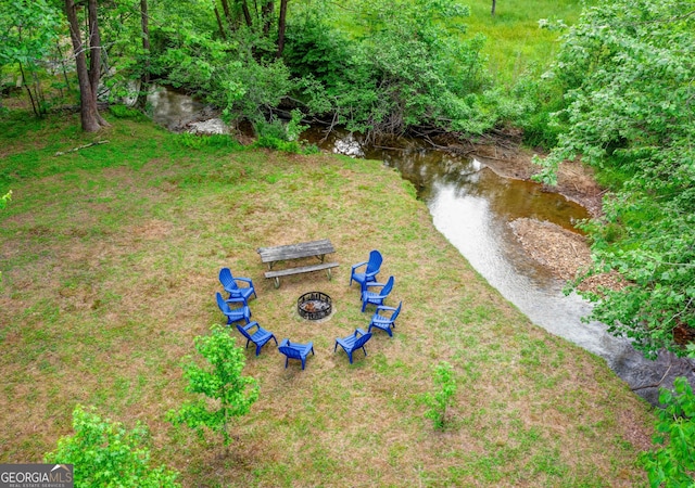 drone / aerial view featuring a water view