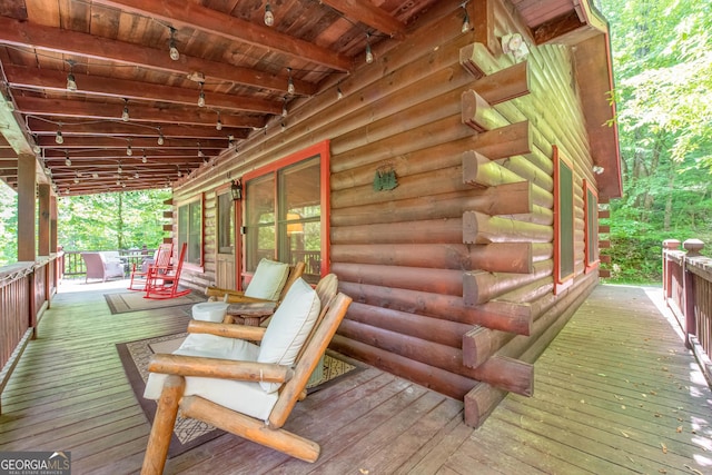 wooden terrace with covered porch