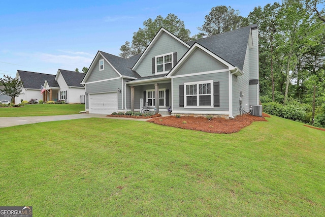 craftsman-style home with a front yard and a garage