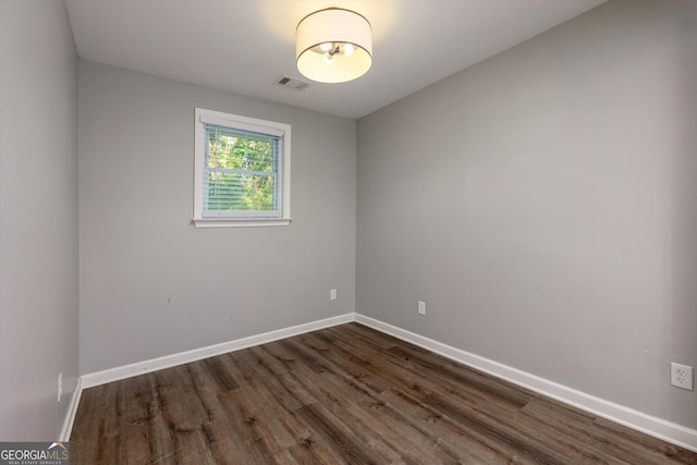 2911 Glenwood Ave SE, Atlanta, GA 30317 - spare room with dark hardwood / wood-style flooring