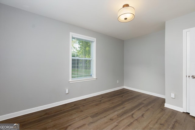 2911 Glenwood Ave SE, Atlanta, GA 30317 - unfurnished room featuring dark wood-type flooring